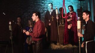 A group of babes and dudes inside costume have nailed group sex inside a dungeon