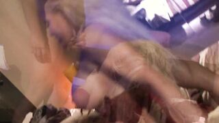 Doting cougar gets her hole penetrated doggy style while she chocks her throat with a much bigger