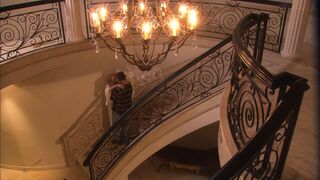 Huge haired blonde submits to a fierce nailing on the stairs