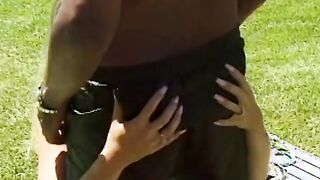 Babe blonde takes a long african cock in her mouth as she blows it then fucks