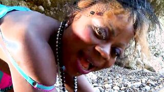 Afriken chick fucks at the lake on rough stones