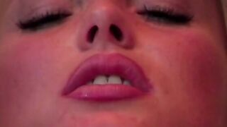 Adorable lesbo going wild as her twat gets licked on the couch