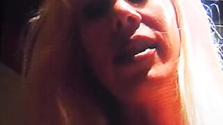 Big Boobed blonde lays on a desk and gets her cunt licked by babe blonde
