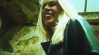 Big Boobed blonde lays on a desk and gets her cunt licked by babe blonde