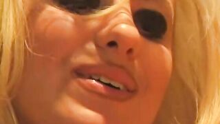Big Boobed blonde lays on a desk and gets her cunt licked by babe blonde