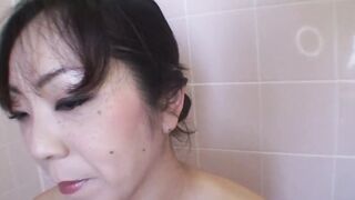 Vulgar chinese chick loves soaping up a teenagers's dick