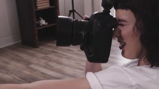 Photographer fucks cunt with mouth with a strap on