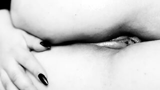 Fucking myself with a toy while filled with cum