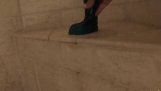 Sticking a toy up her bum and then having a solo masturbation session with a shower