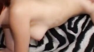 Cutie red head Beauty has sex with 2 men next to zebra pattern pillow