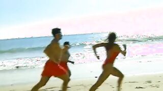 A dark haired lifeguard satisfies her vagina while working