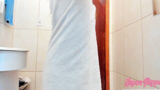 Coming out of the towel-only tub dancing and passing cream on the body
