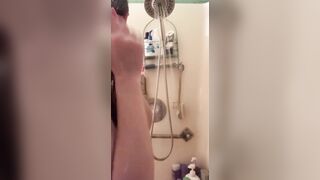 Small skinny ginger taking a shower