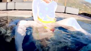 Red XXX fucks her vagina with a vibrator inside the pool