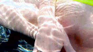Red XXX fucks her vagina with a vibrator inside the pool