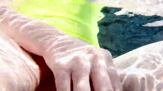 Red XXX fucks her vagina with a vibrator inside the pool