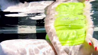 Red XXX fucks her vagina with a vibrator inside the pool