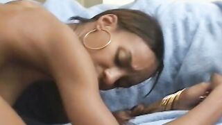 African Beauty takes a load on her face and chest after taking a white penis