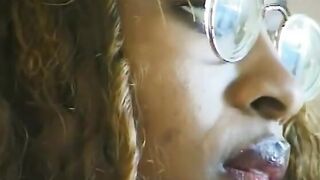 Light skin ebony Girl gets a load of spunk on her juicy lips