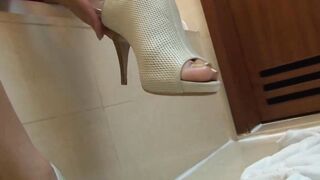 Vulgar cross dressing pleases herself into the hot tub with Sex Toy