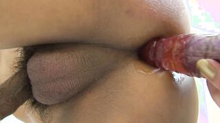 Vulgar cross dressing pleases herself into the hot tub with Sex Toy