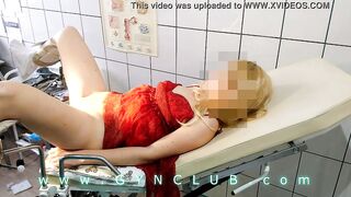 Woman inside red dress on gyno exam