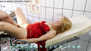 Woman inside red dress on gyno exam