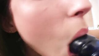 hot Dark Haired making a demo how to Fellatio cock using Sex Toy