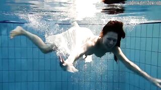 Swimming pool huge breasts teens Andrea