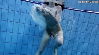 Swimming pool huge breasts teens Andrea