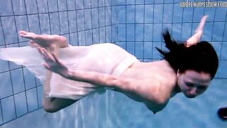 Swimming pool huge breasts teens Andrea