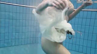 Swimming pool huge breasts teens Andrea