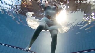 Swimming pool huge breasts teens Andrea