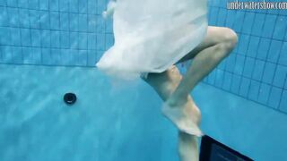Swimming pool huge breasts teens Andrea