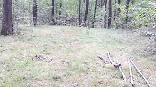 Plays with her holes inside the woods