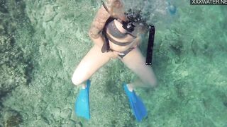 Croatian Girl Kasandra gets naked and masturbates inside water