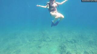 Croatian Girl Kasandra gets naked and masturbates inside water