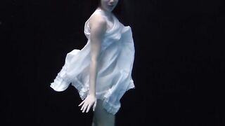 Underwater world of nude babes