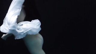 Underwater world of nude babes