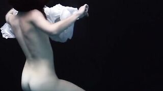 Underwater world of nude babes