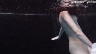 Underwater world of nude babes