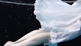 Underwater world of nude babes