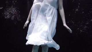 Underwater world of nude babes