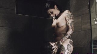 Tattooed les cougar eaten out inside the shower