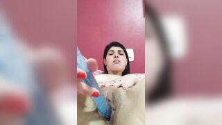 dark haired punching sex toy into cunt