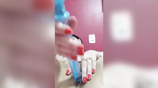 dark haired punching sex toy into cunt