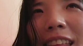 Thin oriental whore loves swallowing huge white dick on the sofa