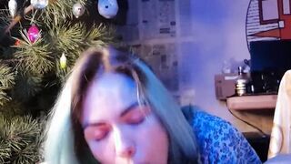 adorable oriental women eats cum under the Christmas tree new year 2023
