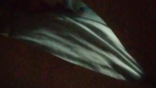 Jasmine is lying on the bed to the music and showing her charms (without sound)