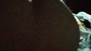 Jasmine is lying on the bed to the music and showing her charms (without sound)